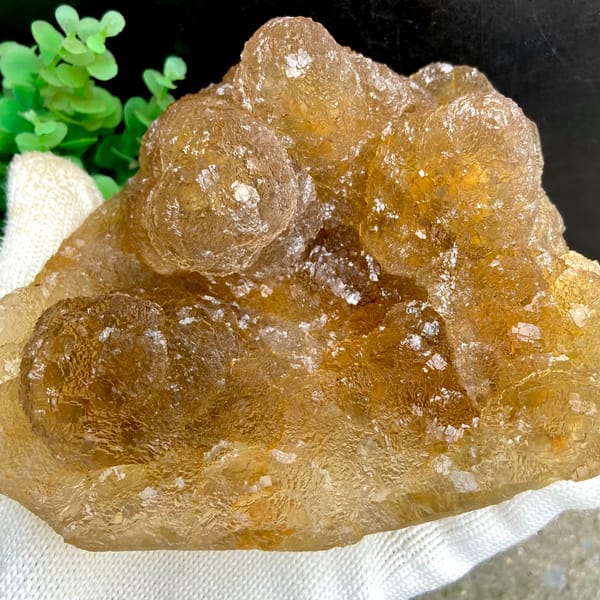 Amber pineapple fluorite of stacked translucent columns from Henan, China, reverse side