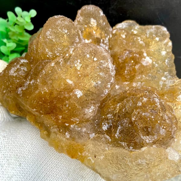 Amber pineapple fluorite of stacked translucent columns from Henan, China, side view