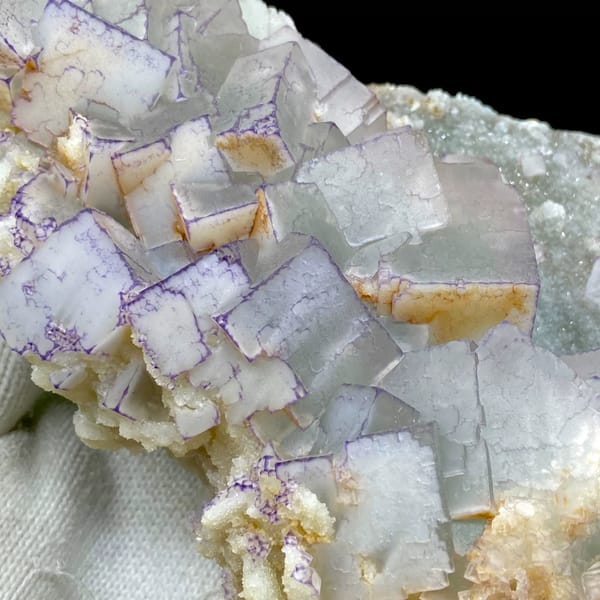 Plate of blue-and-white porcelain fluorite from Guizhou, China, side view
