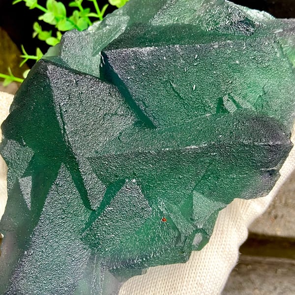 Block of large green fluorite octahedra from Zhejiang, China, reverse side
