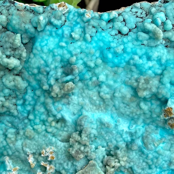 Large plate of turquoise-blue botryoidal hemimorphite from Yunnan, China, close-up of the crystal faces