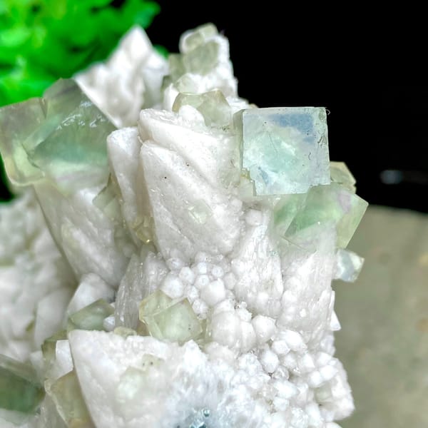 White quartz plate with pale green fluorite cubes from Inner Mongolia, China, reverse side