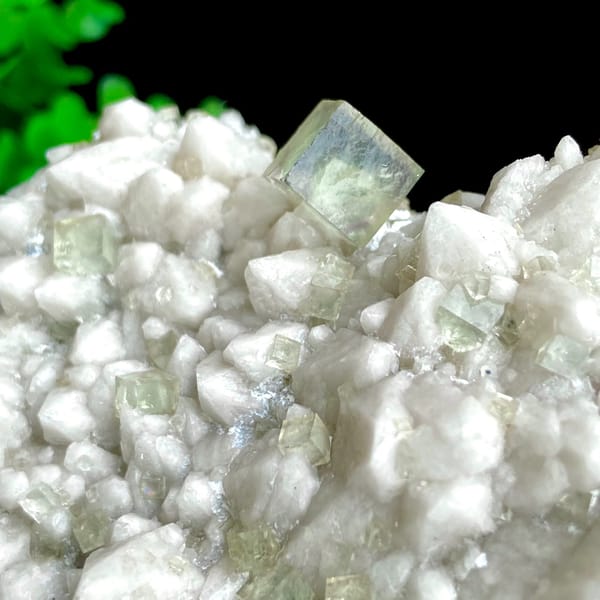 White quartz plate with pale green fluorite cubes from Inner Mongolia, China, top view