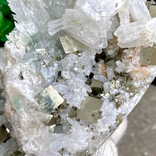 White quartz cluster studded with pyrite cubes from Shangbao, Hunan, China, overall view