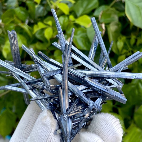 Floater spray of steel-grey stibnite needles from Jiangxi, China, top view