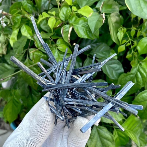 Floater spray of steel-grey stibnite needles from Jiangxi, China, close-up of terminations