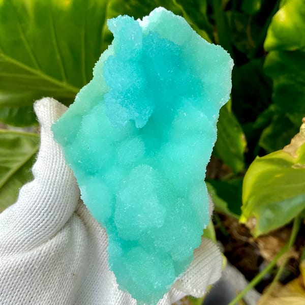 Mound of mint-green acicular aragonite from Sichuan, China, close-up of the crystal faces