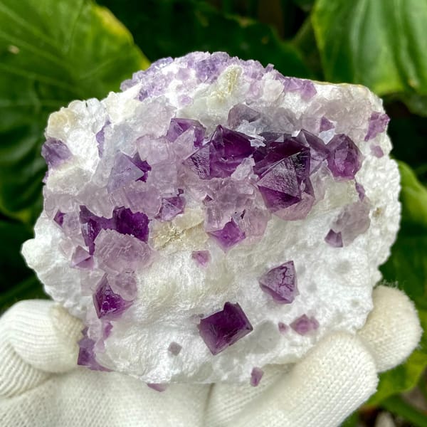 Purple-red fluorite octahedra on white recrystallised block from Zhejiang, China, second angle