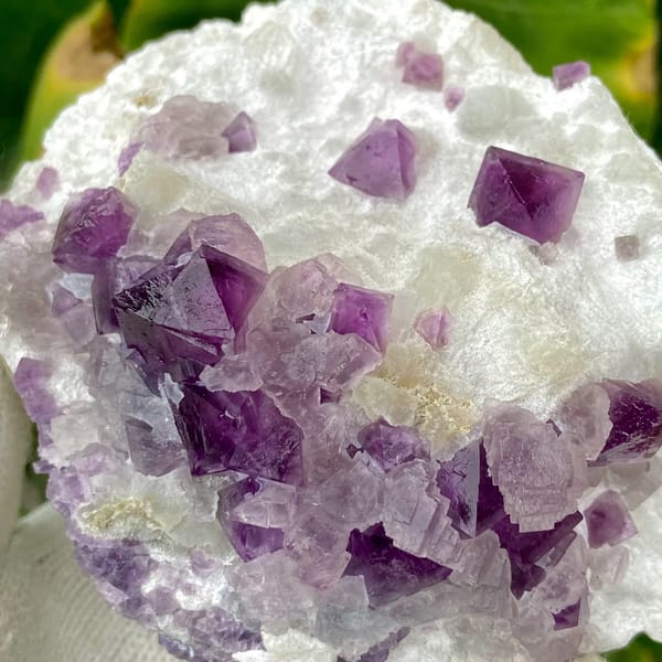 Purple-red fluorite octahedra on white recrystallised block from Zhejiang, China, top view