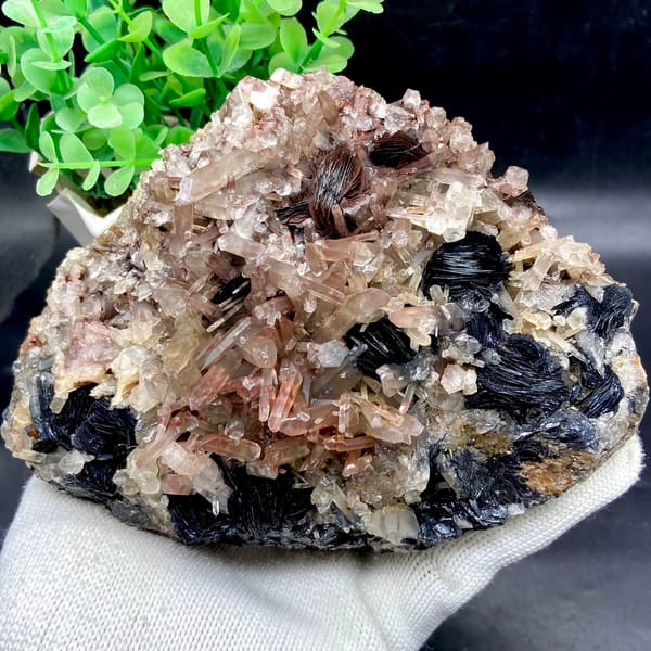 Plate of black specular hematite with pink-skinned quartz from Guangdong, China, second angle