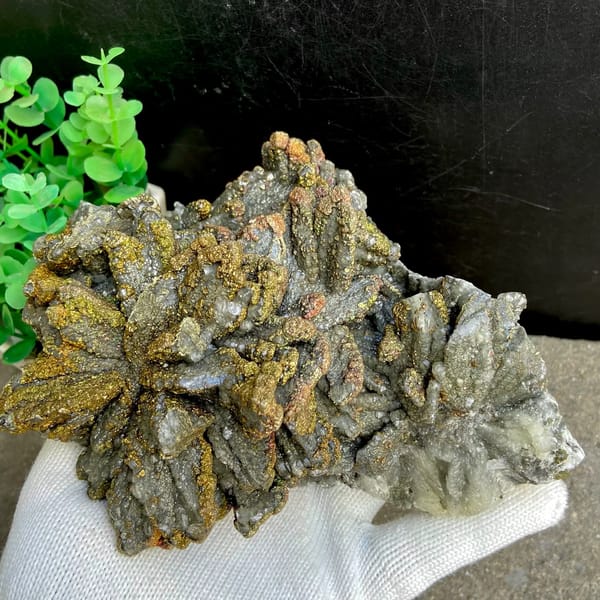 Plate of petal calcite coated in iridescent pyrite from Hubei, China, side view
