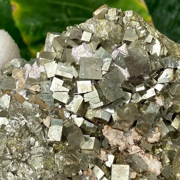 Dome of sharp brassy pyrite cubes from Shangbao, Hunan, China, close-up of terminations