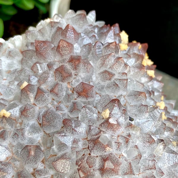 Red-skinned quartz fan with dolomite on carved stand from Jiangxi, China, top view