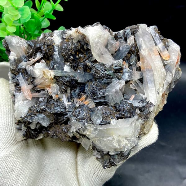Plate of black specular hematite with quartz prisms from Guangdong, China, second angle