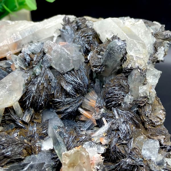 Plate of black specular hematite with quartz prisms from Guangdong, China, reverse side