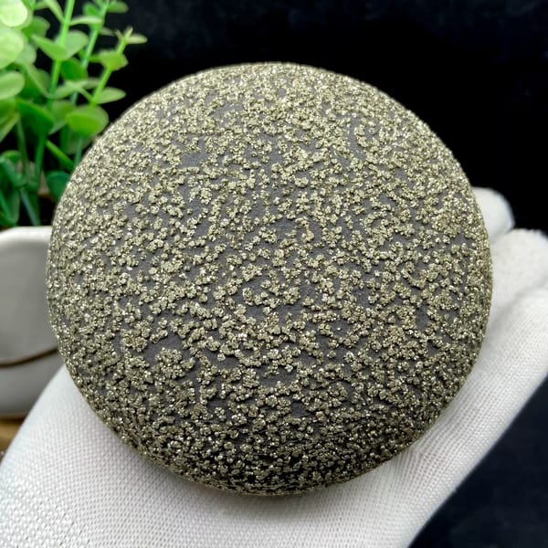 Large iron concretion sphere dusted with pyrite from Yunnan, China, close-up of the crystal faces