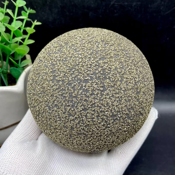 Large iron concretion sphere dusted with pyrite from Yunnan, China, side view
