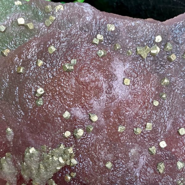 Pink-purple botryoidal fluorite dome speckled with pyrite from Jiangxi, China, second angle