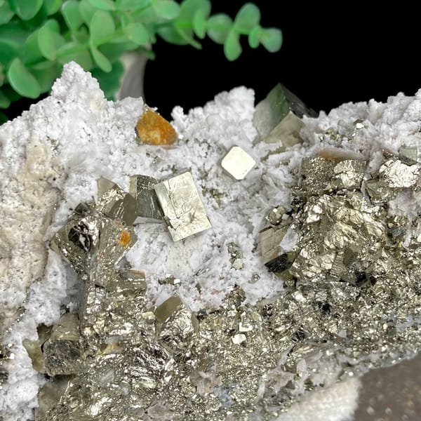 Pyrite cluster set in white matrix from Shangbao, Hunan, China, reverse side