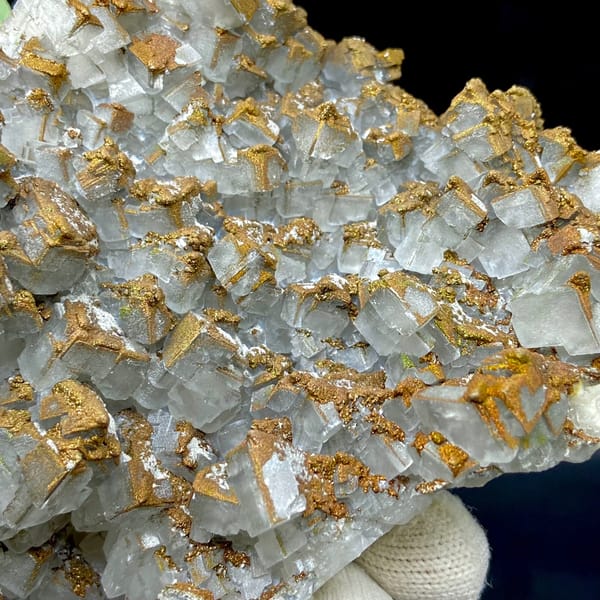 Plate of pale pyramid calcite coated in rusty iridescent pyrite from Hunan, China, reverse side