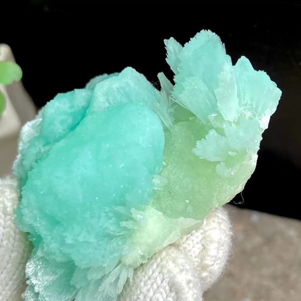 Two-tone mint and pale blue acicular aragonite from Sichuan, China, detail of the matrix contact