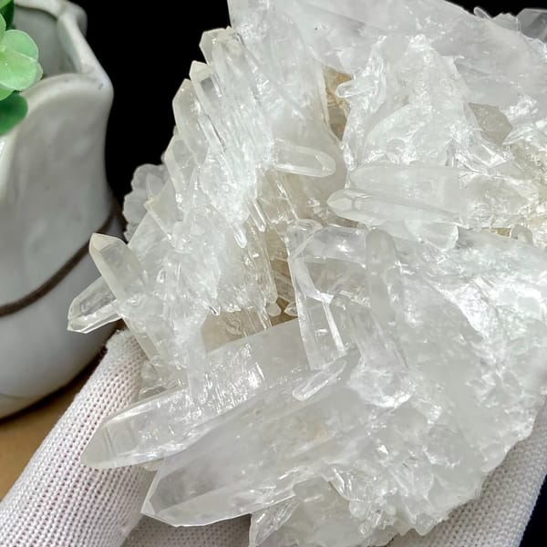 Cluster of clear double-terminated quartz needles from Jinkouhe, Sichuan, China, top view