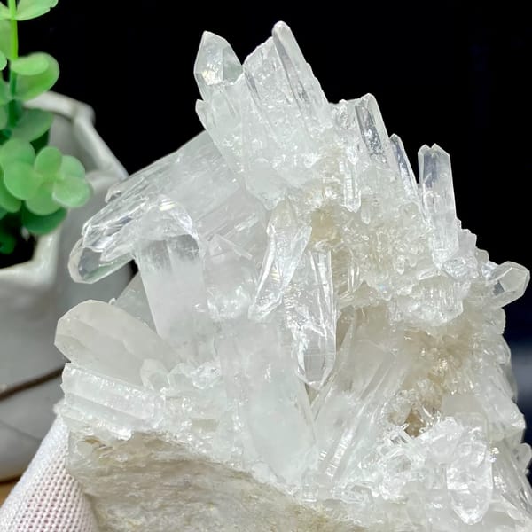 Cluster of clear double-terminated quartz needles from Jinkouhe, Sichuan, China, overall view