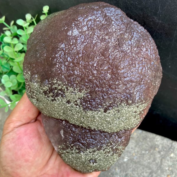 Plum-purple botryoidal fluorite ball dusted with pyrite from Jiangxi, China, second angle