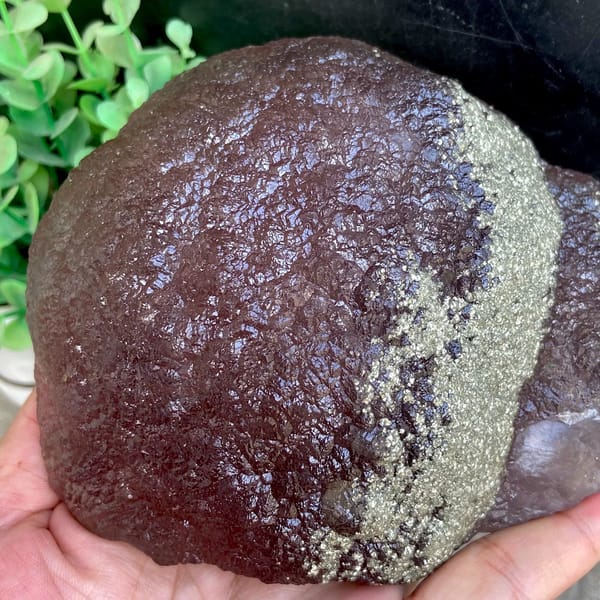 Plum-purple botryoidal fluorite ball dusted with pyrite from Jiangxi, China, reverse side