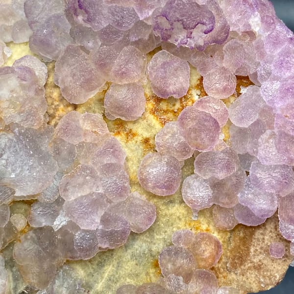 Plate of lavender botryoidal fluorite from Guizhou, China, close-up of terminations