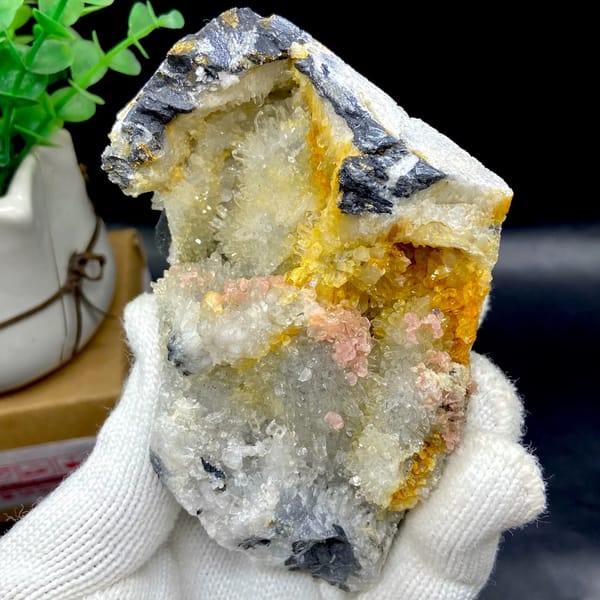 Platy rhodochrosite in quartz pocket rimmed by dark sulfide from Guangxi, China, second angle