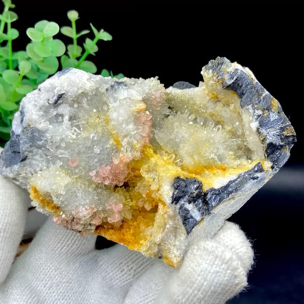 Platy rhodochrosite in quartz pocket rimmed by dark sulfide from Guangxi, China, reverse side