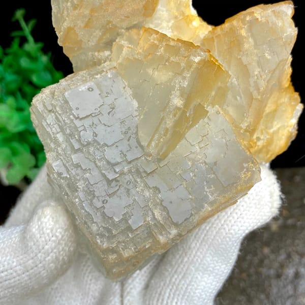 Pale stepped fluorite cube with honey-yellow edges from Hunan, China, top view