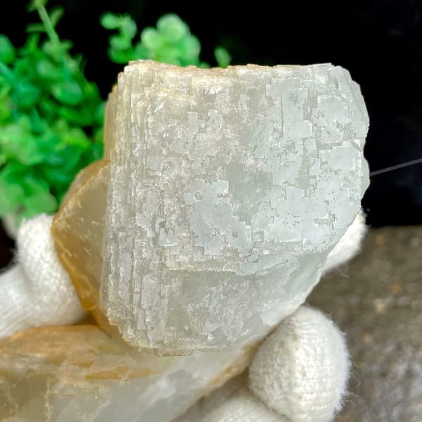 Pale stepped fluorite cube with honey-yellow edges from Hunan, China, overall view