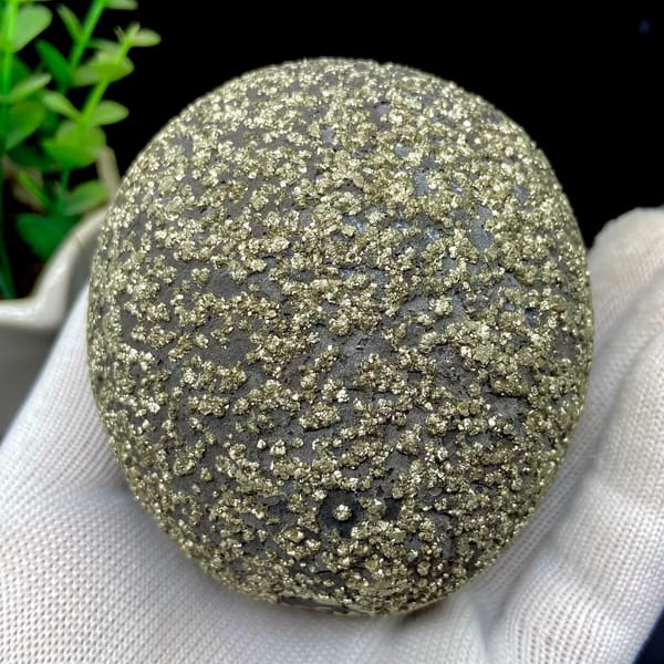 Iron concretion sphere with dense pyrite crust from Yunnan, China, detail of the matrix contact