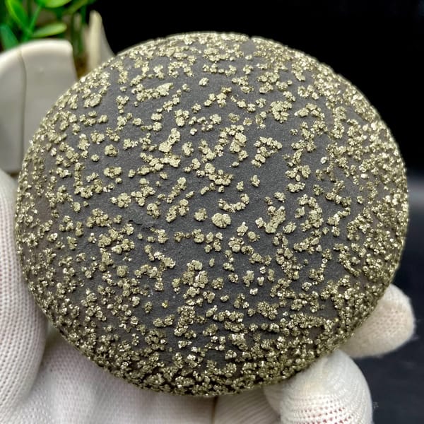 Iron concretion sphere dusted with pyrite from Yunnan, China, side view