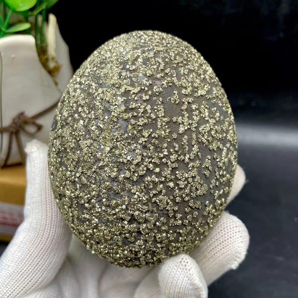 Iron concretion sphere dusted with pyrite from Yunnan, China, close-up of terminations