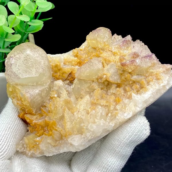 Pale calcite rhombs with yttrian fluorite on golden quartz from Guizhou, China, second angle