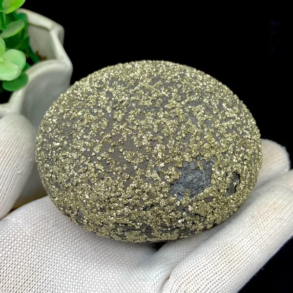 Iron concretion sphere speckled with pyrite from Yunnan, China, side view