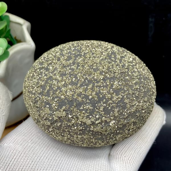 Iron concretion sphere speckled with pyrite from Yunnan, China, close-up of terminations