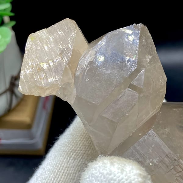 Two pale topaz crystals with sharp terminations from Pakistan, close-up of the crystal faces