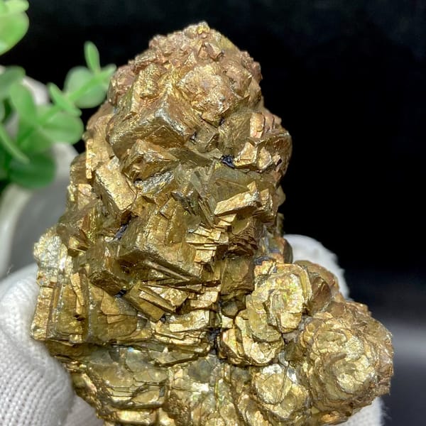 Stack of stepped brassy pyrite crystals from Yunnan, China, close-up of the crystal faces