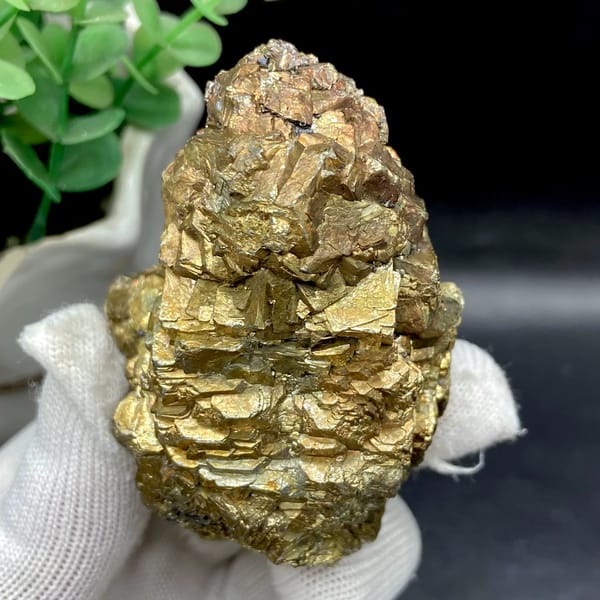 Stack of stepped brassy pyrite crystals from Yunnan, China, side view