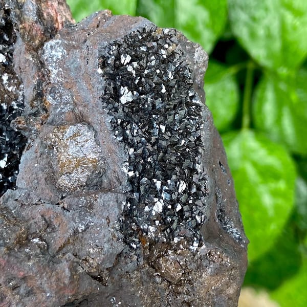 Mass of platy black hematite from Yunnan, China, side view