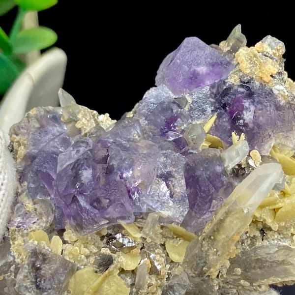 Purple fluorite cubes with quartz and siderite from Yaogangxian, Hunan, China, close-up of the crystal faces