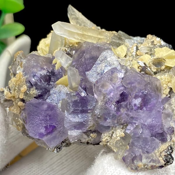 Purple fluorite cubes with quartz and siderite from Yaogangxian, Hunan, China, detail of the matrix contact