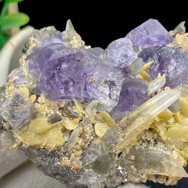 Purple fluorite cubes with quartz and siderite from Yaogangxian, Hunan, China, side view