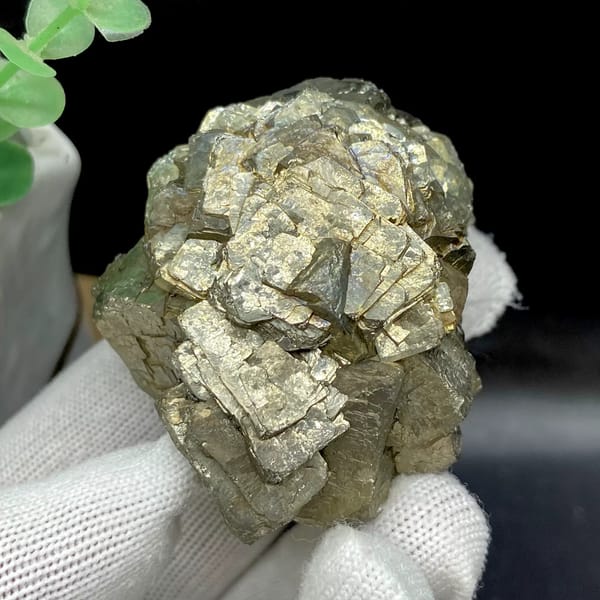 Stepped pyrite crystal stack with pale metallic sheen from Yunnan, China, top view