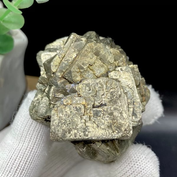 Stepped pyrite crystal stack with pale metallic sheen from Yunnan, China, side view