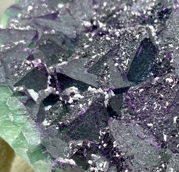 Dark green fluorite octahedra with purple edges and sparkling coating from Zhejiang, China, overall view